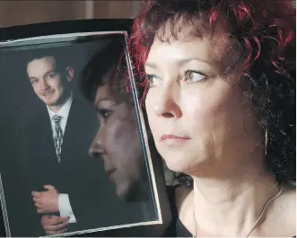 ?? TED RHODES/FILES ?? Sparla McCann holds a photo of her 19-year-old son Rory 15 months ago. Rory died of a fentanyl overdose not long after packing his bags for a 2015 family trip. He had a lengthy battle with cocaine, not fentanyl.