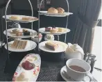  ??  ?? The afternoon tea towers. Gluten free, left.