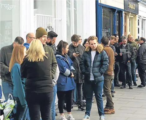  ??  ?? ABOUT 80 people queued around the block to get their hands on special vinyls released on record Store Day in Broughty Ferry.
Members of Dundee indie fourpiece The View signed a limited 10th anniversar­y vinyl re-release of their debut album, Hats Off...