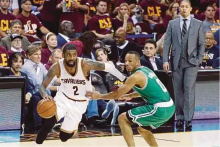  ?? EPA PIC ?? Cleveland’s Kyrie Irving (left) dribbles past Boston’s Avery Bradley in Ohio on Sunday.