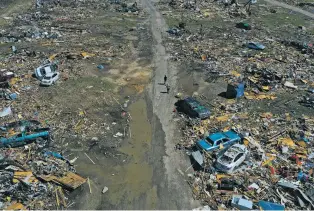  ?? JAHI CHIKWENDIU/WASHINGTON POST FILE PHOTO ?? A mobile home park outside Rolling Fork, Miss., following a tornado that struck in March 2023.