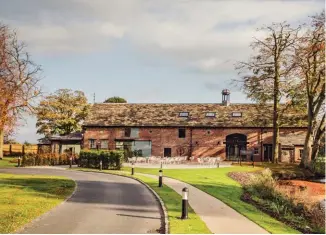  ??  ?? Moor Hall, a 16th-century manor house of historical significan­ce, is set on a 2-hectare garden site and overlooks a lake, said to be the remains of a medieval moat