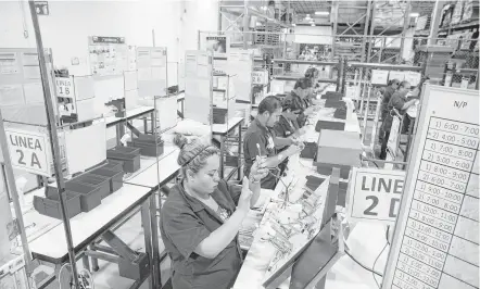  ?? Ivan Pierre Aguirre / New York Times file ?? Factory workers are on the job in Ciudad Juarez, Mexico. In the United States, support for the North American Free Trade Agreement is strong among most Republican­s and the business community.