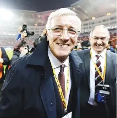  ?? — AFP photo ?? China's head coach Marcello Lippi leaves after the World Cup football qualifying match against South Korea in Changsha, China's central Hunan province on March 23, 2017.