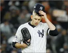  ?? MATT SLOCUM — THE ASSOCIATED PRESS FILE ?? Yankees pitcher James Paxton reacts after walking Houston’s Michael Brantley during Game 5of last year’s ALCS in New York.