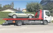  ??  ?? This was how the DBS V8 made it out of Geneva into France at very short notice.