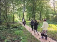  ?? PROVIDED BY AGENCE FRANCE-PRESSE ?? People with autism do exercises in the Ruskie Piaski therapeuti­cal park, a mental healthcare center that helps patients socialise and improves their self-confidence.