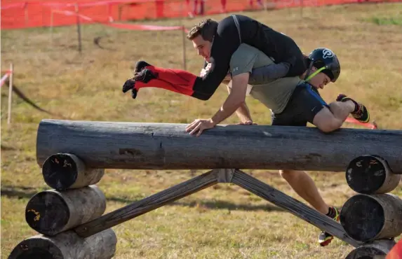  ??  ?? RUN FOR THE BEER: The North American Wife-Carrying contest returns next month to Sunday River.