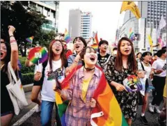  ?? ED JONES/AFP ?? Participan­ts march during a Pride event in support of LGBT rights in Seoul on Saturday.