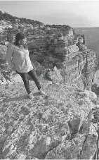  ?? DAVID WALLACE/THE ARIZONA REPUBLIC ?? Laura Trujillo looks over the Grand Canyon, where her mother jumped and died by suicide in 2012.