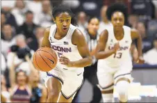  ?? Jessica Hill / Associated Press ?? Crystal Dangerfiel­d and the UConn women’s basketball team will take on DePaul on Monday.