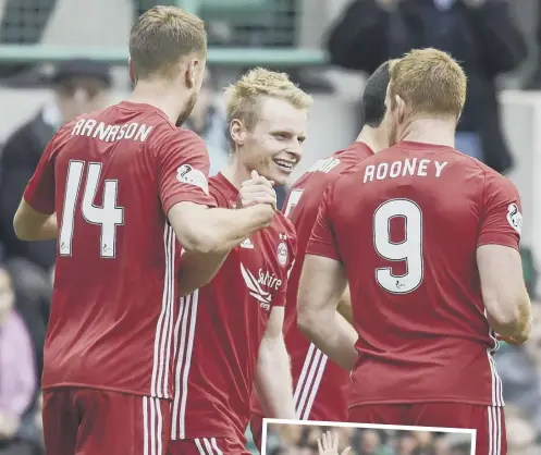  ??  ?? 0 Gary Mackay-steven is all smiles as he celebrates his winner on Saturday; Hibs manager Neil Lennon, who admitted it was a goal of real quality, responds to some heckling from the away end by giving a little wave.