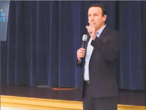  ?? Michael P. Mayko / Hearst Connecticu­t Media ?? U. S. Sen. Chris Murphy speaks to the audience during his town hall meeting at Derby Middle School on Saturday.