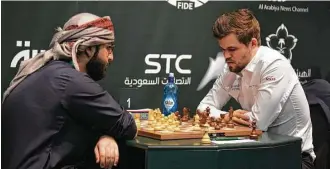  ?? AFP / Getty Images ?? The World Chess Federation’s regulation­s stipulate that no player should be refused the opportunit­y to participat­e, but players from three states — Iran, Qatar and Israel — had initially not received visas.