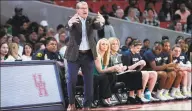  ?? David J. Phillip / Associated Press ?? UConn coach Geno Auriemma yells to his players during the first half.