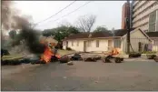  ?? SOURCE: FILE PICTURE ?? Tenants of Howell Road barricaded the entrance to their lowcost housing complex.