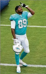  ?? GETTY IMAGES ?? Tight end Julius Thomas is one of three Dolphins to meet with Commission­er Roger Goodell and NFL owners about social issues.