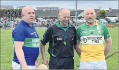 ?? ?? Legends captains - Pat Barry and Tom Mulcahy, with the referee.