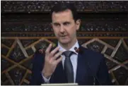  ?? SANA VIA AP ?? Syrian President Bashar Assad, gives a speech at the parliament building, in Damascus, Syria.