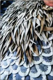  ?? SUNDIE RUPPERT VIA AP ?? This March 2018 photo provided by Sundie Ruppert shows a detail view of the hat maker’s felt remnants in the Silver Penciled Rock Rooster artwork she made with her husband, Brad Ruppert, at their Des Moines, Iowa, studio. The mixed-media art also...