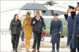  ?? REUTERS ?? US President Donald Trump and first lady Melania Trump leave to view storm damage in Texas.