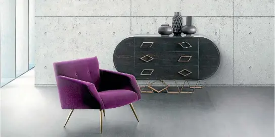  ?? KELLY HOPPEN ?? The Kelly Occasional Chair is available at Frobisher to be customised in your chosen colour and fabric. Here, a deep plum fabric is finished with brushed brass legs. The Sting Cabinet is also shown.