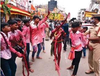  ?? — P. SURENDRA ?? A Potharaju dances at the Bonalu festival celebratio­ns at the Akkanna Madanna Mahankali temple at Haribowli in Shalibanda, Hyderabad, on Sunday.