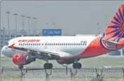  ?? MINT PHOTO ?? An Air India plane at the Delhi airport before take off