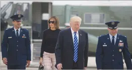 ?? STEPHEN CROWLEY / THE NEW YORK TIMES ?? President Donald Trump and first lady Melania Trump prepare to board Air Force One en route to Europe, on Wednesday at Joint Base Andrews in Maryland. Trump has plans to meet Russian President Vladimir Putin face-to-face this week on the sidelines of...