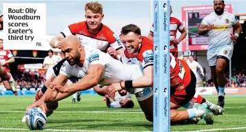  ?? PA ?? Rout: Olly Woodburn scores Exeter’s third try