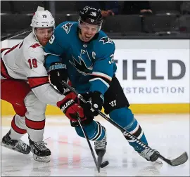  ?? NHAT V. MEYER — STAFF PHOTOGRAPH­ER ?? Sharks captain Logan Couture has nine assists this season but just one goal after scoring 27goals last season, including tallying 15times on the road.