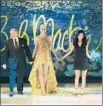  ??  ?? BOB Mackie and student designer Jennifer Choi, right, take a bow with model.