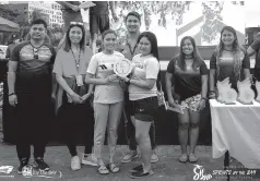  ??  ?? MEMBERS of team Ricspeed Dragon Boat Davao receive their champion trophy.