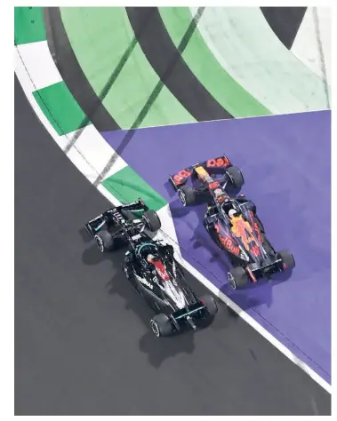  ?? GETTY IMAGES ?? Close call: Max Verstappen and Lewis Hamilton battle for track position during the F1 Grand Prix of Saudi Arabia.