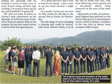  ??  ?? The England squad and members of the media observe a two-minute silence to mark Armistice Day at their hotel in Kandy, Sri Lanka