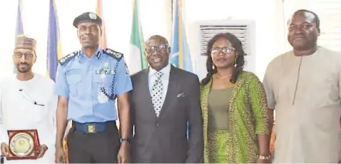  ??  ?? Managing Director, Peugeot Automobile Nigeria (PAN), Boyi Ibrahim (left); Inspector General of Police, Adamu Mohammed; General Manager, Sales and Marketing, Bawo Omatsigbe; Abuja Zonal Manager, Olayinka Seriki; and National Sales Consultant, PAN, Dr. Ayodele Ogunsan during a business visit to the IGP at the Police Headquarte­rs, Abuja.