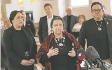  ?? JASON PAYNE ?? Squamish Nation elected councillor Syexwáliya (Ann Whonnock), centre, speaks at the opening of the Language Nest on Friday.