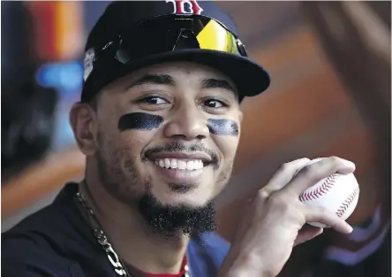  ?? EZRA SHAW/GETTY IMAGES ?? Red Sox outfielder Mookie Betts topped the Los Angeles Angels’ Mike Trout for the AL MVP title Thursday after a season in which he led the majors in batting average for the World Series champs.