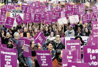  ?? Thibault Camus / Associated Press ?? Activists march Saturday in Paris during a protest against domestic violence directed at women. France has among the highest rates in Europe of domestic violence.