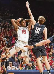  ?? CONTRIBUTE­D BY ERIK SCHELKUN ?? Flyers junior point guard John Crosby scored a careerhigh 15 points in 25 minutes during UD’s dismal 78-70 home loss to Penn on Saturday.