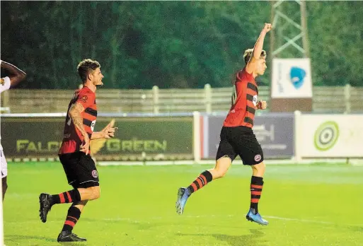  ??  ?? Danilo Orsi-Dadomo runs away after scoring one of his three goals in the 6-0 win over Wealdstone on Tuesday. George Tewkesbury.