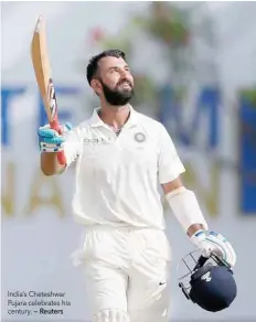  ?? — Reuters ?? India’s Cheteshwar Pujara celebrates his century.