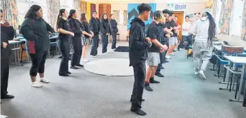  ?? ?? The students learning kapa haka.