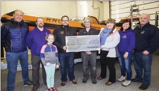  ??  ?? Presenting € 630 from the RNLI fundraiser were: Tommy Craddock, John Barrett, Arlene Barrett, David Bradley, Chris McDaid, Jackie Cunnigham, Celine Kelly- Barrett and Dermott Gillen.