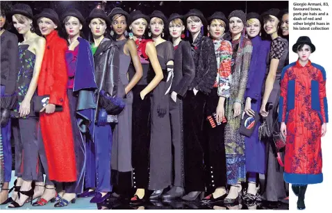  ??  ?? Giorgio Armani, 83, favoured bows, pork pie hats and a dash of red and other bright hues in his latest collection