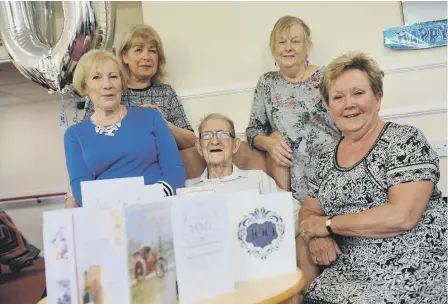  ??  ?? Leonard Wells with nieces, from left, Brenda Harris, Gwen White, Judith Weaver and Marilyn Henderson.