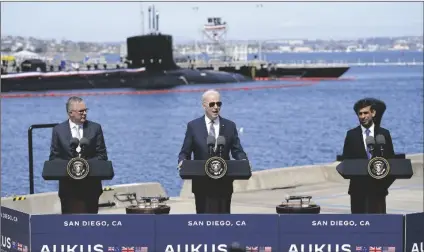  ?? EVAN VUCCI/ AP ?? PRESIDENT JOE BIDEN speaks after meeting with British Prime Minister Rishi Sunak (right) and Australian Prime Minister Anthony Albanese at Naval Base Point Loma on Monday in San Diego.