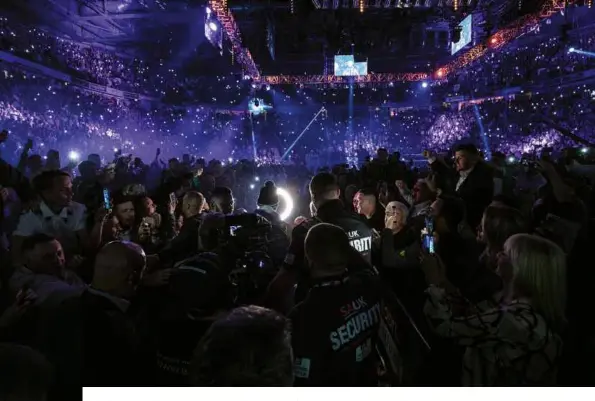  ?? Photos: MARK ROBINSON/ MATCHROOM ?? ON THE MARCH: Bellew makes his way to the ring for the 34th time