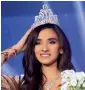  ?? — AFP ?? Sandy Tabet reacts after she was crowned Miss Lebanon at Casino Du Liban in Jounieh, north of Beirut.