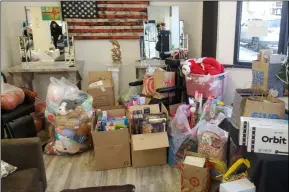  ?? EDWIN HATHAWAY PHOTO ?? Toys pile up for the YWCA toy drive at dropoff location Clippers Barbershop in Troy.